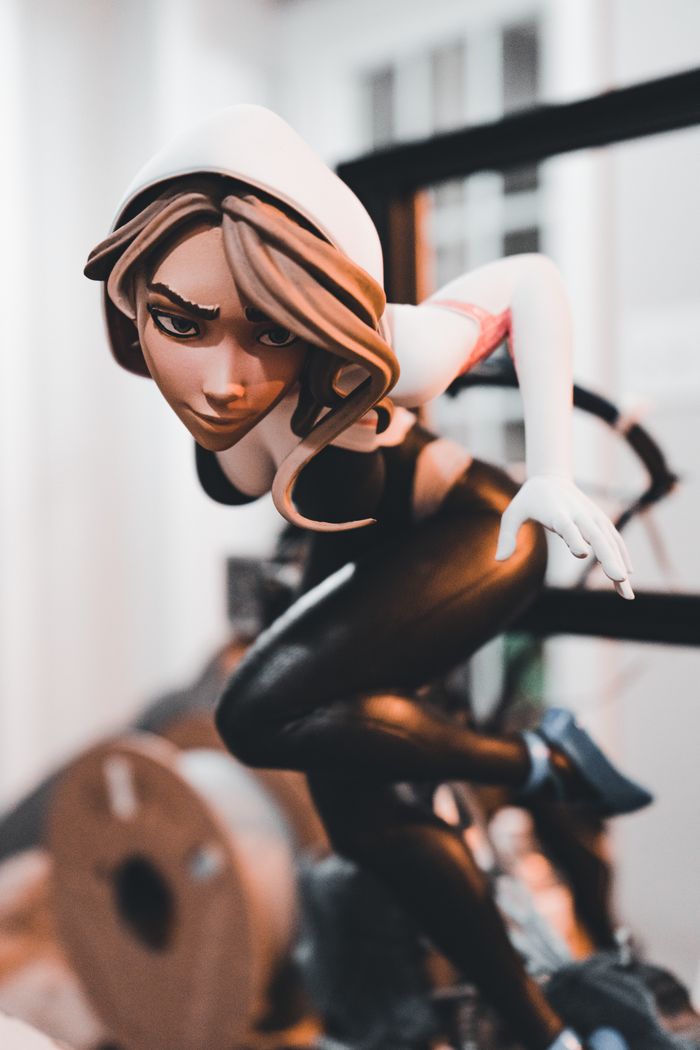 Close-up of a dynamic toy figure with a fierce expression, captured indoors.