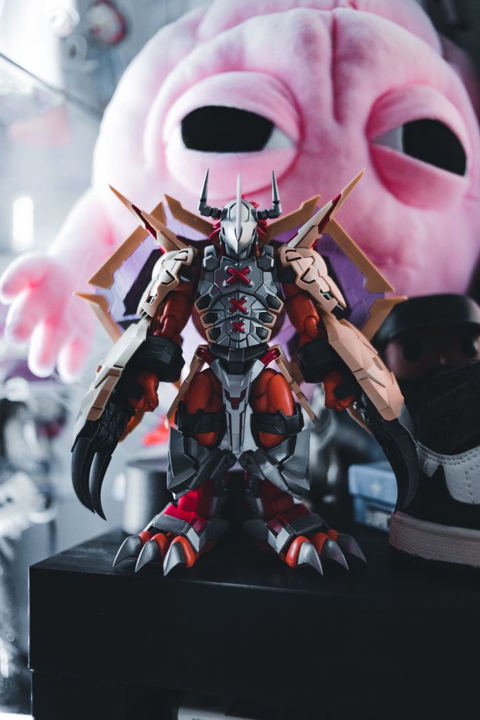 A detailed close-up shot of a Digimon toy, highlighting its intricate design.